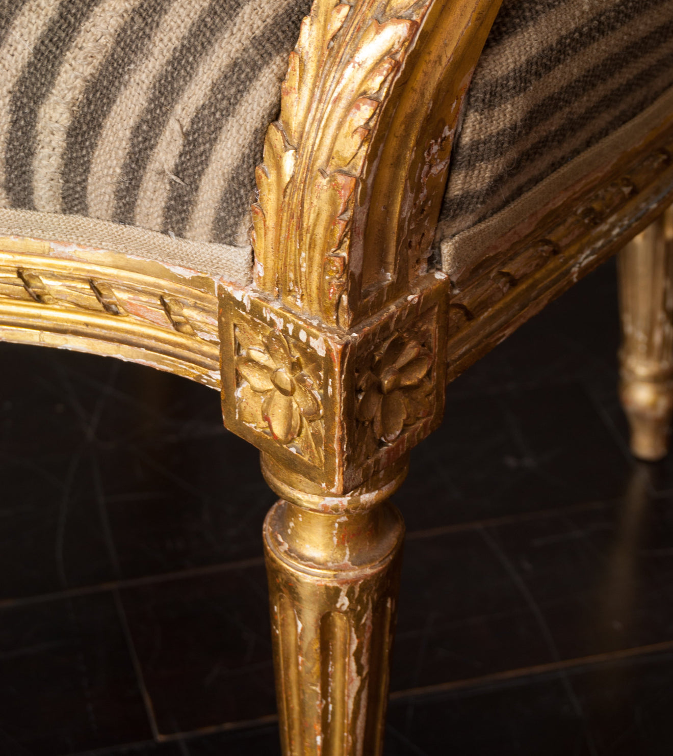 Pair of Louis the XVI Carved and Gilded Chairs with Antique African upholstery